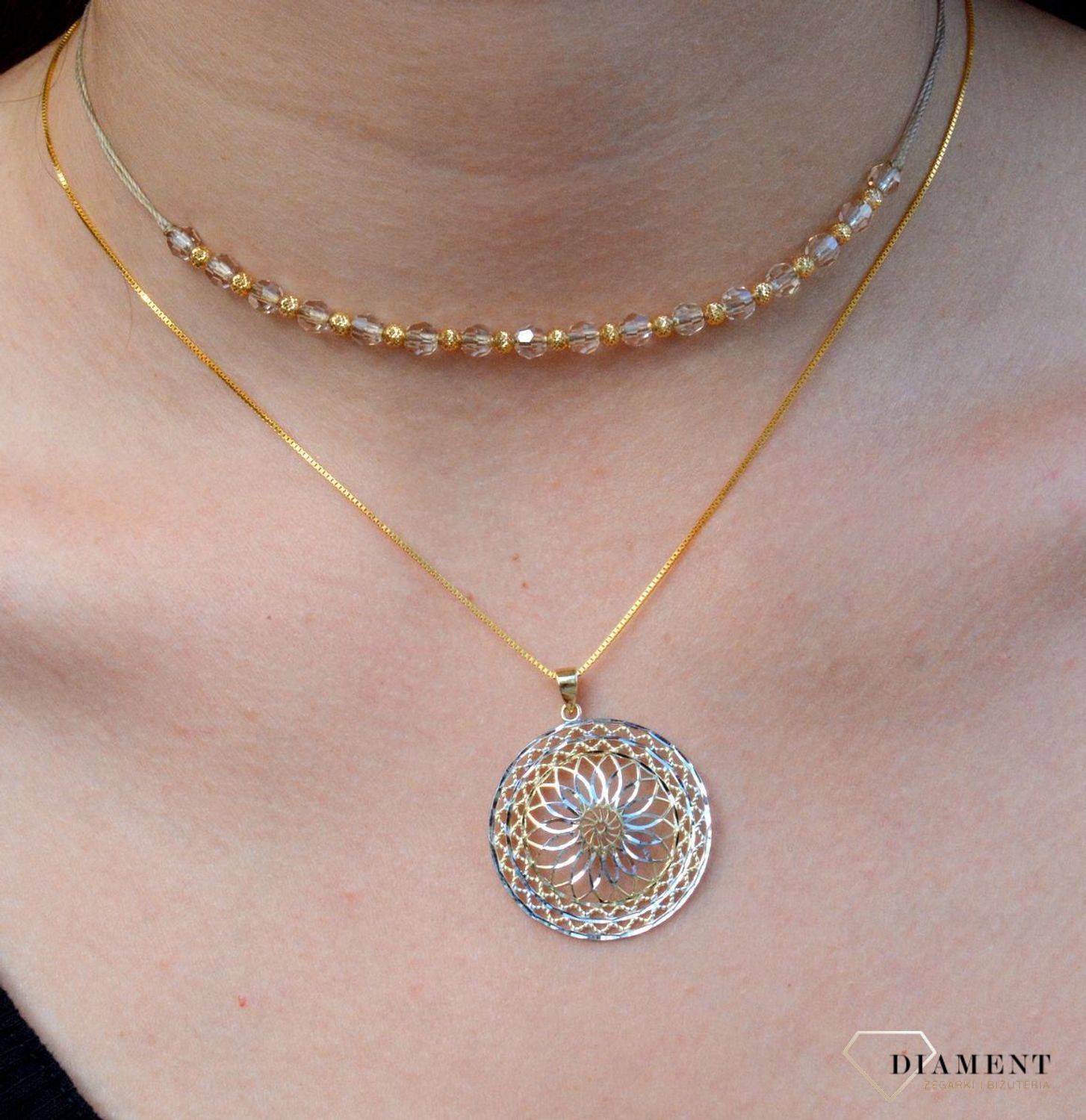 Złota, ażurowa zawieszka pr333 kwiatek ZA 5282 333. Wisiorek na łańcuszek w klasycznym, ponadczasowym ażurowym wzorze wykonany z dwukolorowego złota. Dodatkowo białe złoto delikatnie połyskuje..jpg